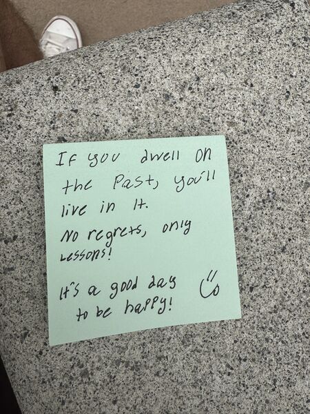Handwritten sticky note with words of encouragement